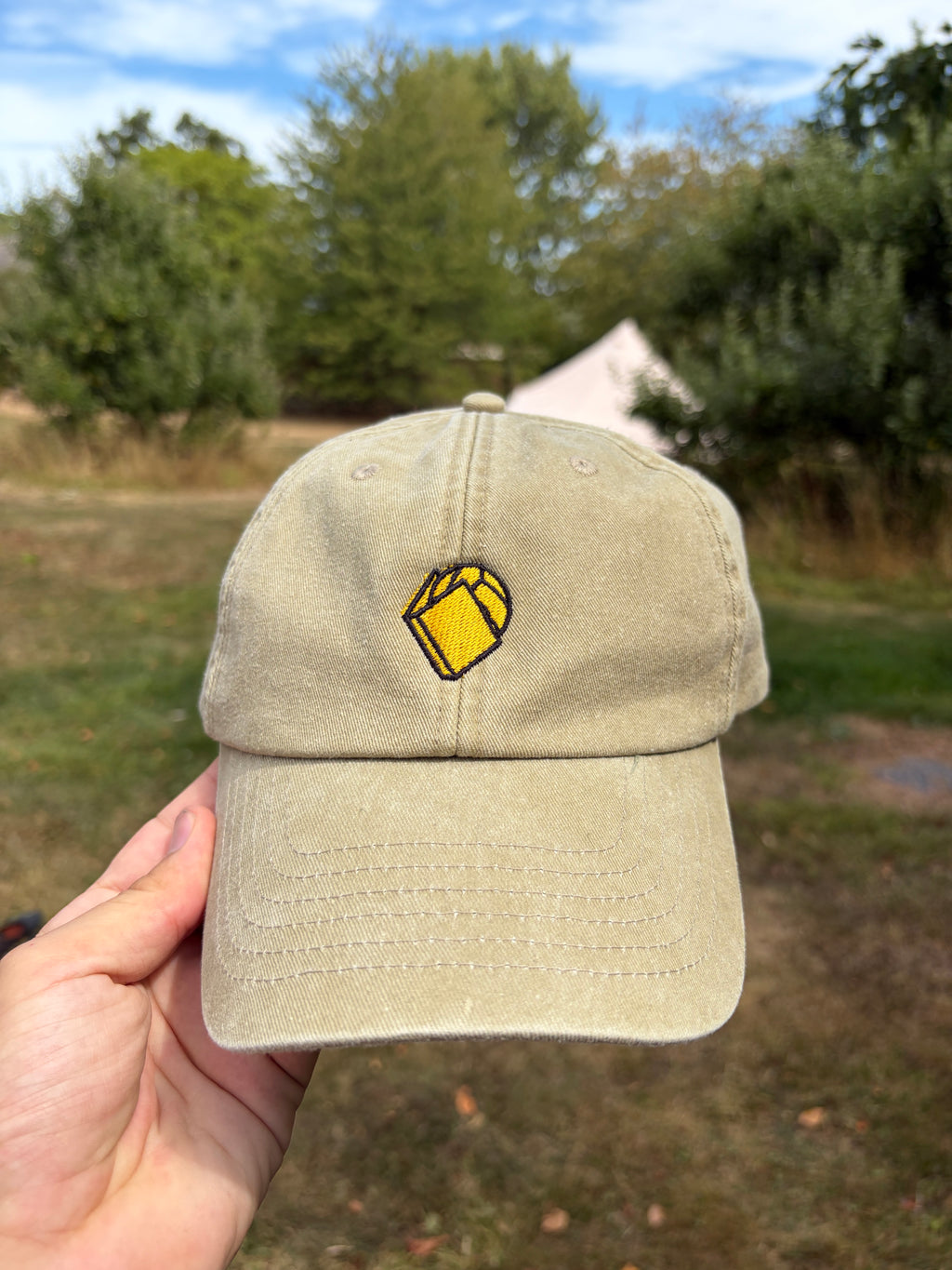 THE BOOK AND BALL CAP